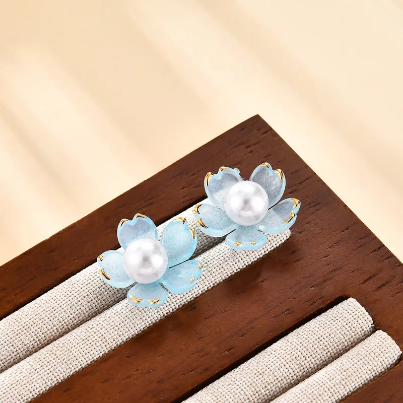 Arete diseño floral